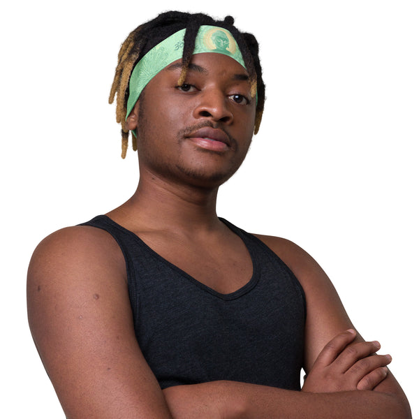 Jade Buddha headband great for yoga classes and gym workouts. Om signs and lotus petals embedded in the design. Artist, Sushila Oliphant with Apparel for the Spirit.