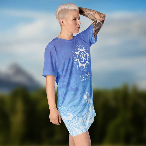 Om Shanti, Peace A t-shirt dress depicting unity of humanity and higher consciousness. An om sign and Do no harm on the back. Good vibes. Artist Sushila Oliphant and Apparel for the Spirit.