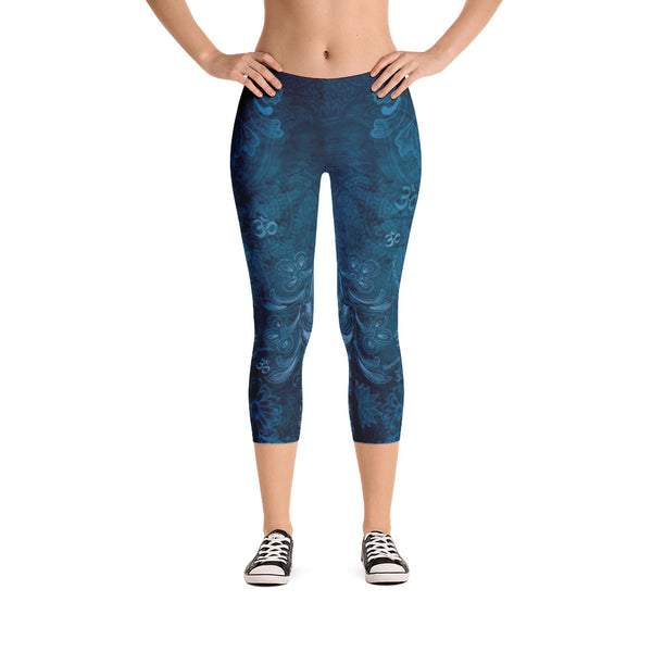 Saraswati indigo capri leggings with om signs, mantras and stylized lotus petals. Great for yoga and gym workouts! Designed by Sushila Oliphant, Apparel for the Spirit.