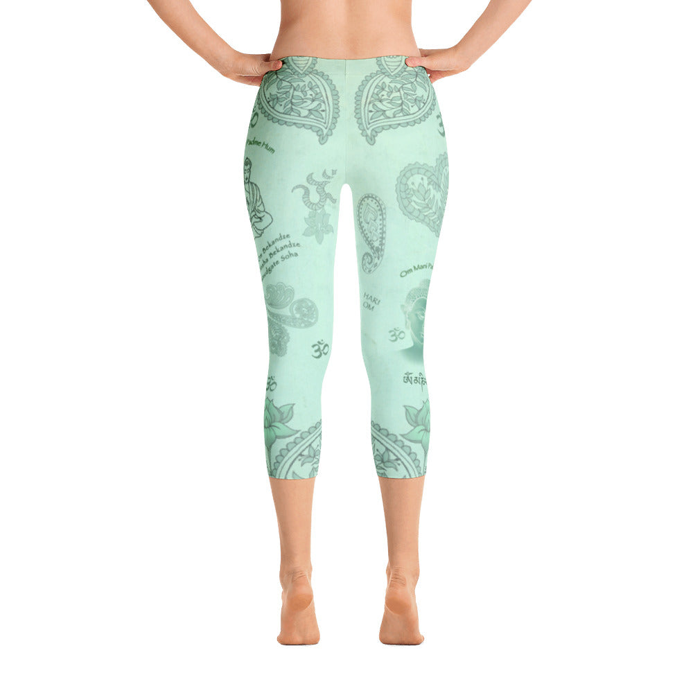 Jade green Buddha capri leggings with om signs, mantras and stylised lotus petals. Great for yoga and gym workouts! Designed by Sushila Oliphant, Apparel for the Spirit.