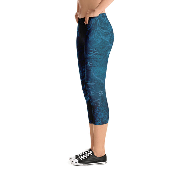 Saraswati indigo capri leggings with om signs, mantras and stylized lotus petals. Great for yoga and gym workouts! Designed by Sushila Oliphant, Apparel for the Spirit.
