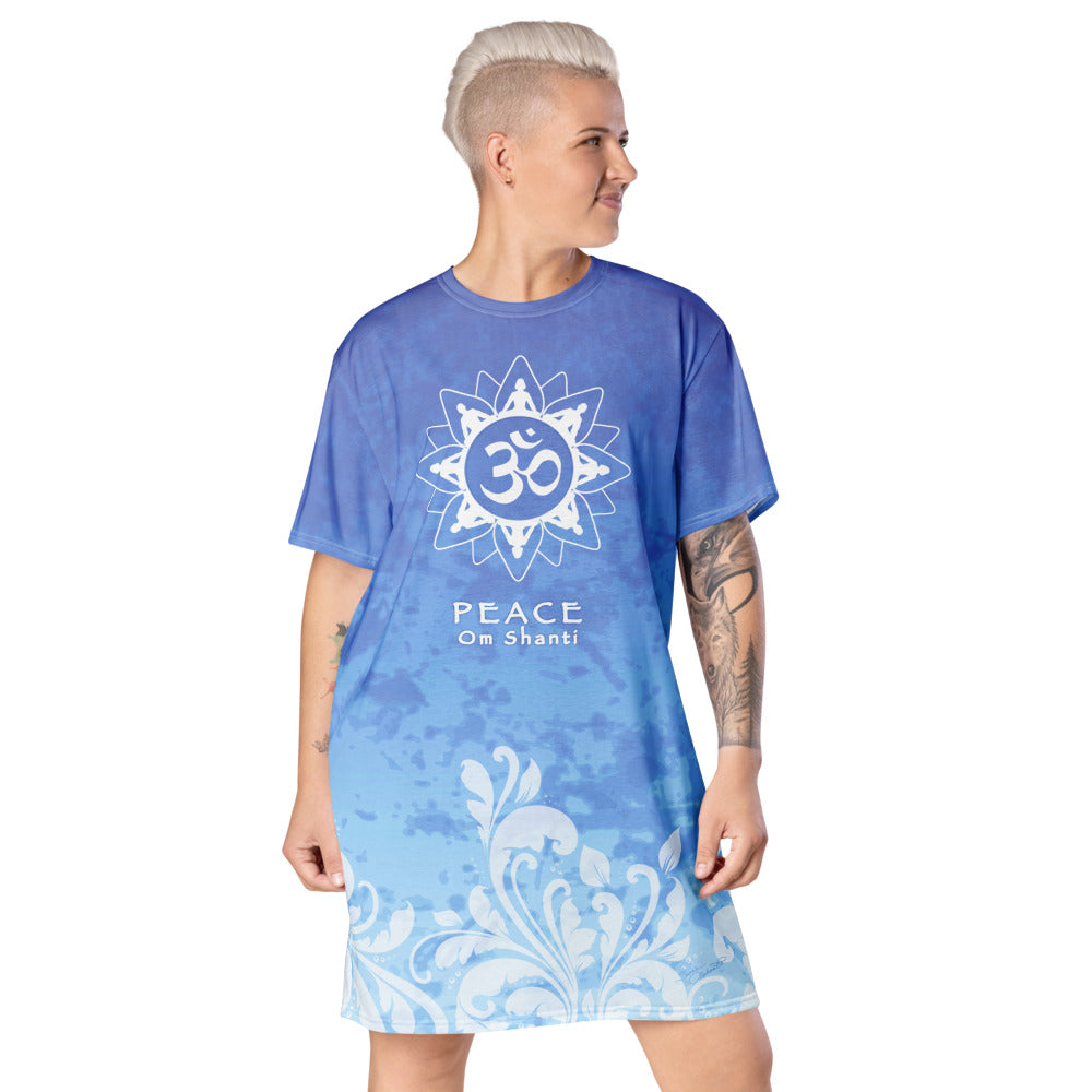Om Shanti, Peace A t-shirt dress depicting unity of humanity and higher consciousness. An om sign and Do no harm on the back. Good vibes. Artist Sushila Oliphant and Apparel for the Spirit.
