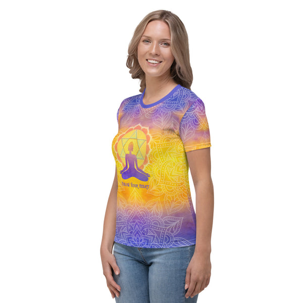 Follow Your Heart women's t-shirt. Heart chakra and yogi meditating, om sign, and lotus. Very spiritual vibe. Artist, Sushila Oliphant and Apparel for the Spirit.