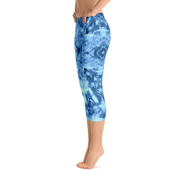 Cosmic Blues capri leggings with abstract tribal themed art. Great for yoga and gym workouts! Designed by Sushila Oliphant, Apparel for the Spirit.