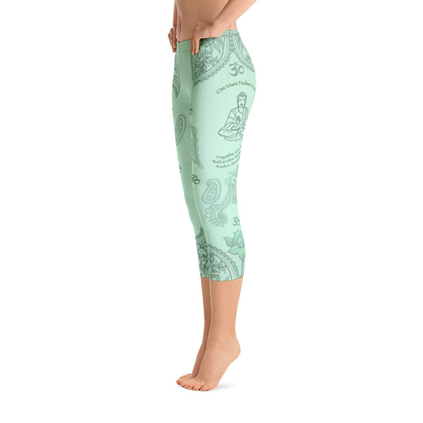 Jade green Buddha capri leggings with om signs, mantras and stylised lotus petals. Great for yoga and gym workouts! Designed by Sushila Oliphant, Apparel for the Spirit.