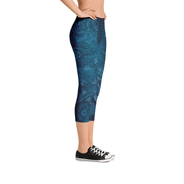 Saraswati indigo capri leggings with om signs, mantras and stylized lotus petals. Great for yoga and gym workouts! Designed by Sushila Oliphant, Apparel for the Spirit.